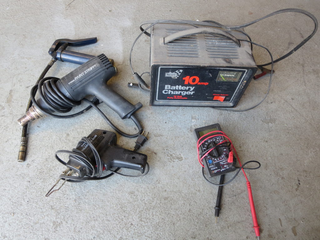 Heat gun, solder gun, grease gun, multimeter, battery charger